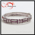 rhodium plated cz copper bangle with ruby stone